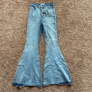 We the free high waisted button fly bell bottom flare light wash jeans size 27